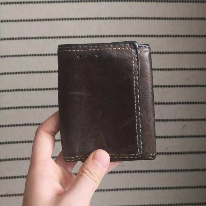 Leather wallet, well-worn photo 1