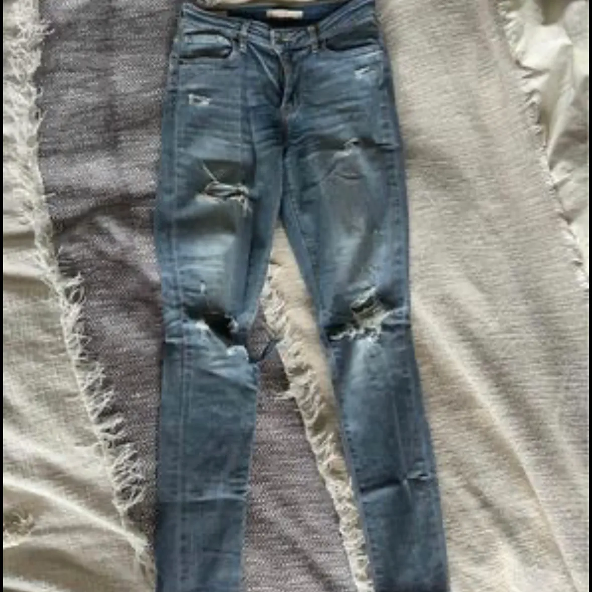Levi’s distressed skinny jeans  photo 3