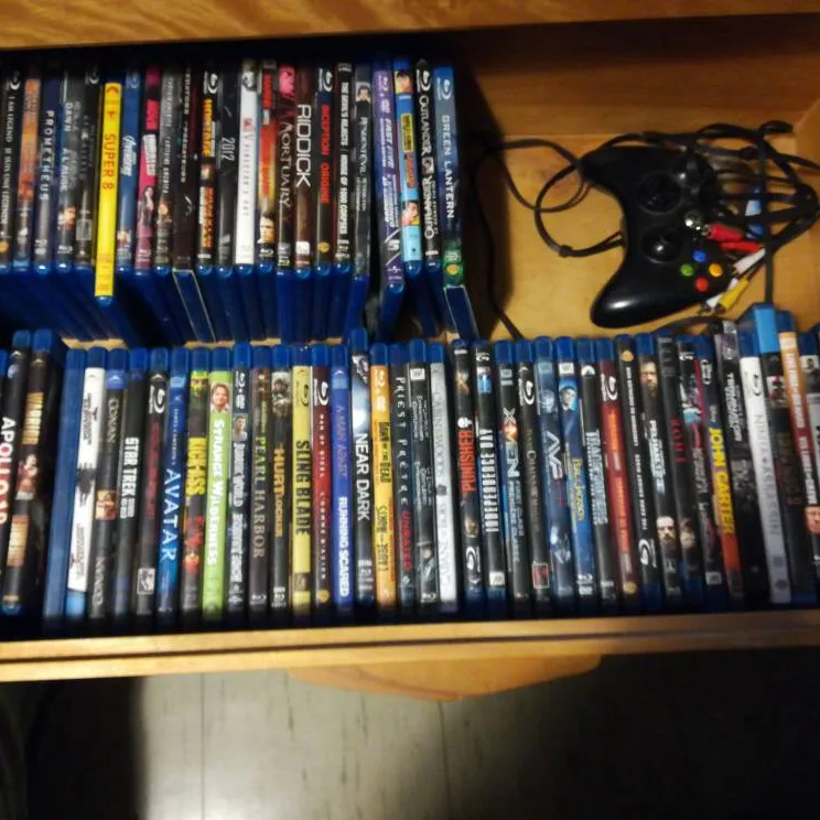 I Gently Used Blue Ray Player With 76 Movies. photo 3