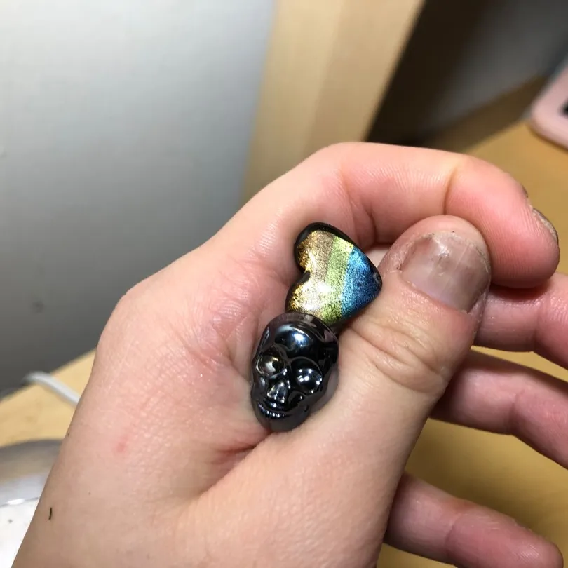 00g glass skulls and pride hearts spacers! photo 1