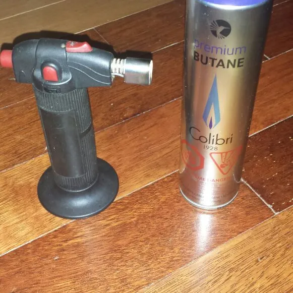 torch and butane can photo 1