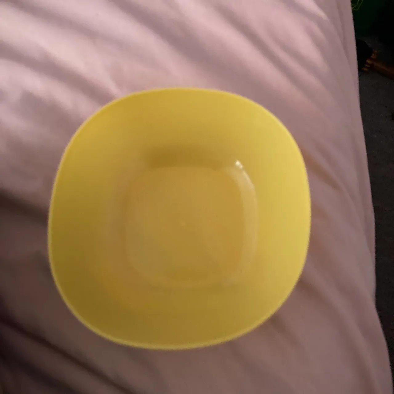 Yellow plastic bowl photo 1