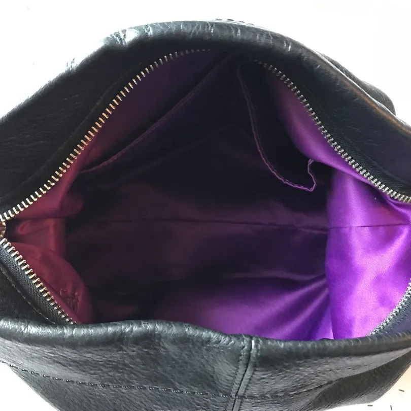 Black all-leather Coach purse photo 4