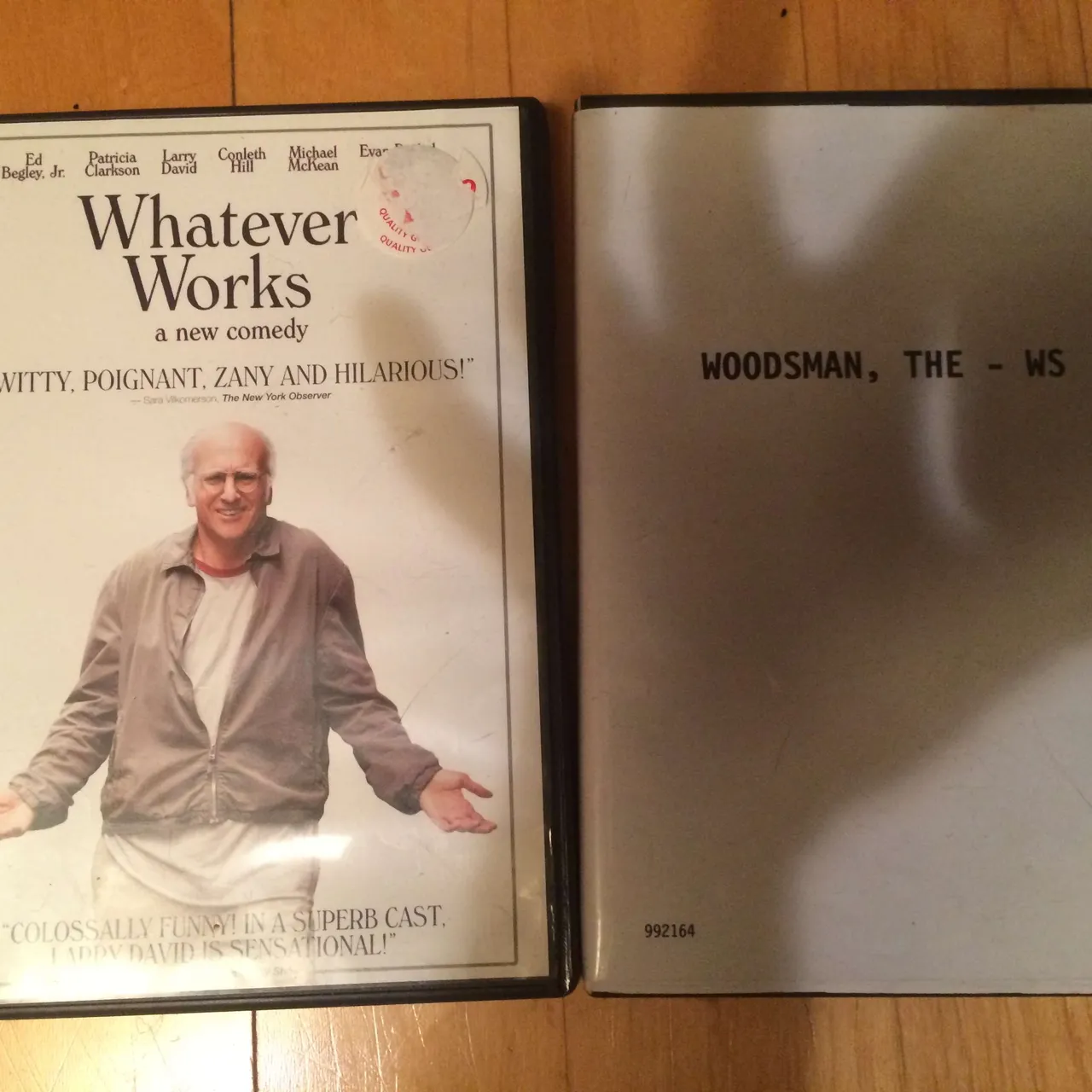 2 DVD movies - one funny and one not at all funny photo 1