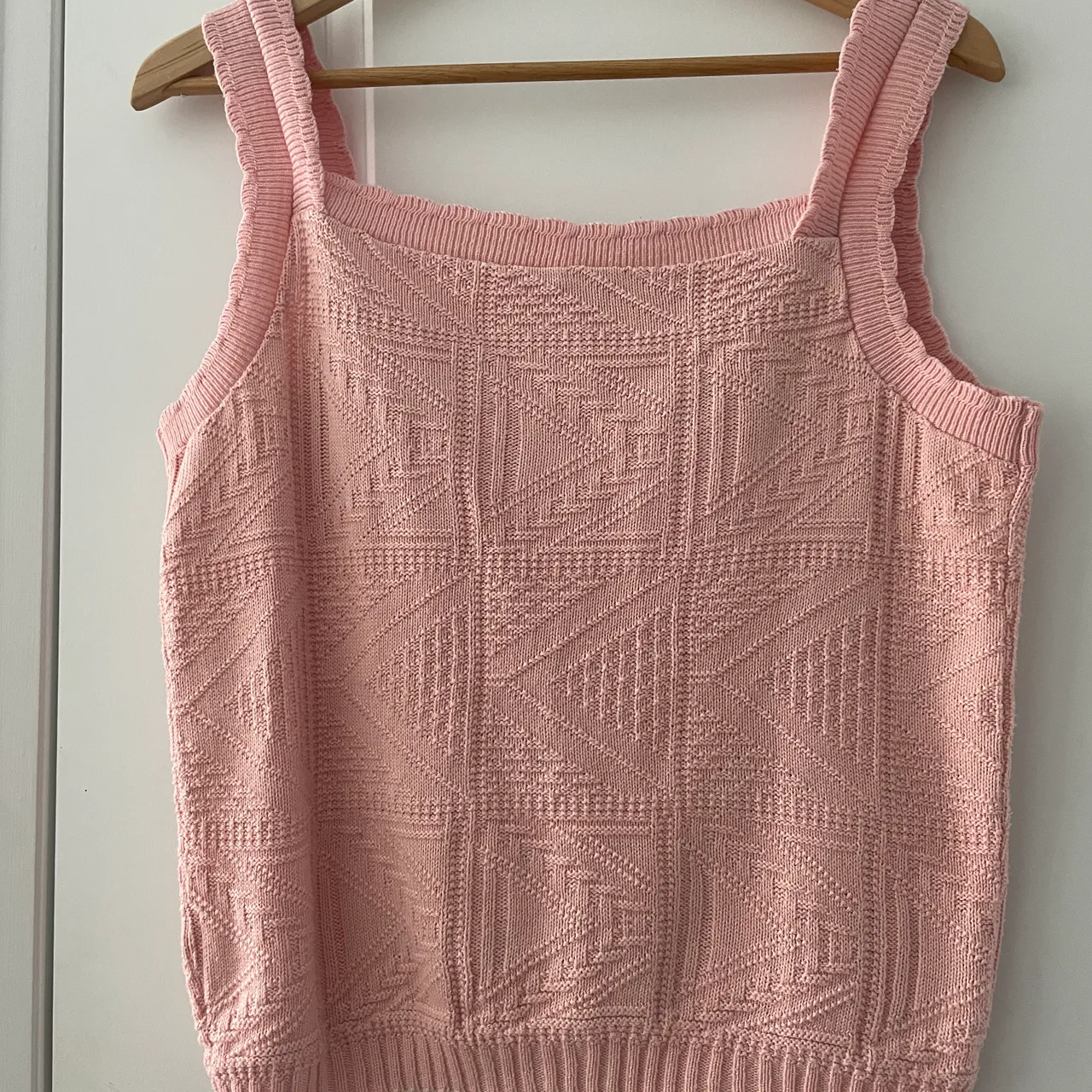 Pink sweater vest photo 1