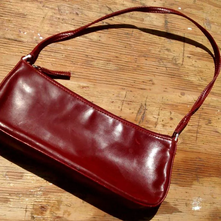 Burgundy purse photo 1