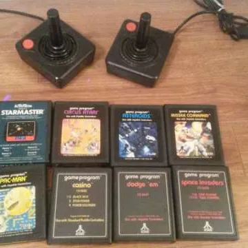 8 Atari Games And Two Controllers photo 1