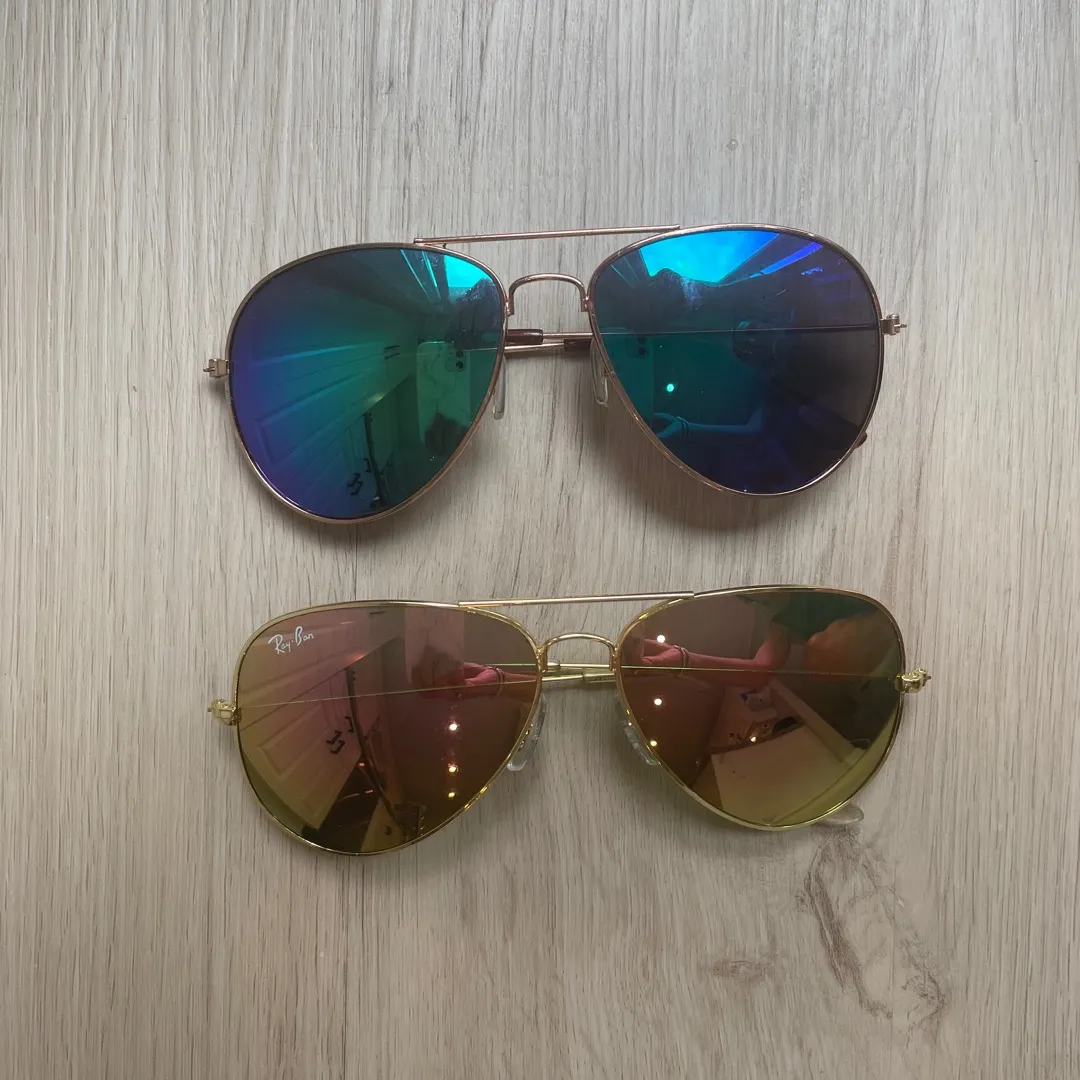 Two Pairs Of Sunglasses photo 1