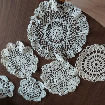 Hand-sewn lace coasters photo 1
