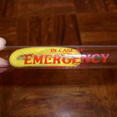 Gag gift.  Condom in a glass vial.  Says "In case of emergenc... photo 1