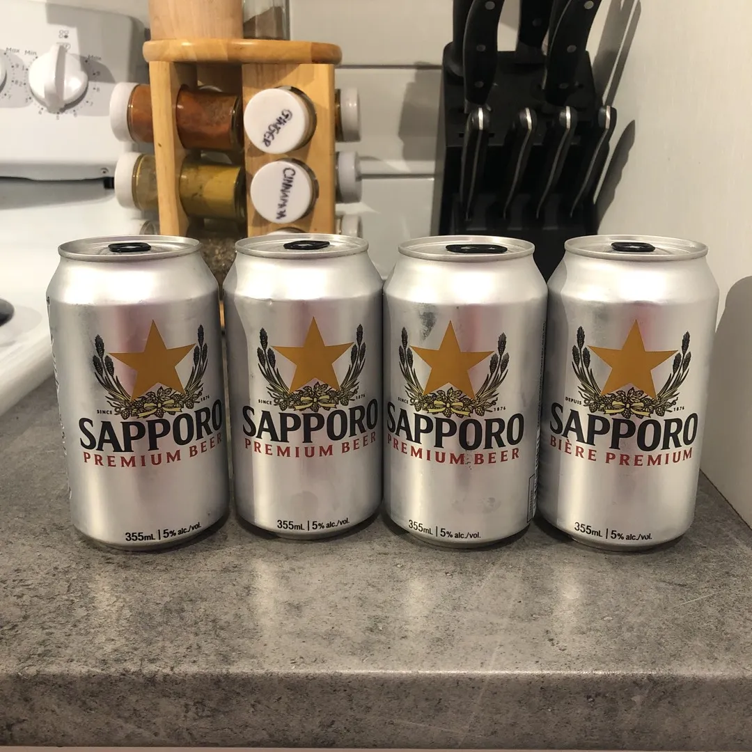 Four Cans Of Sapporo Beer photo 1