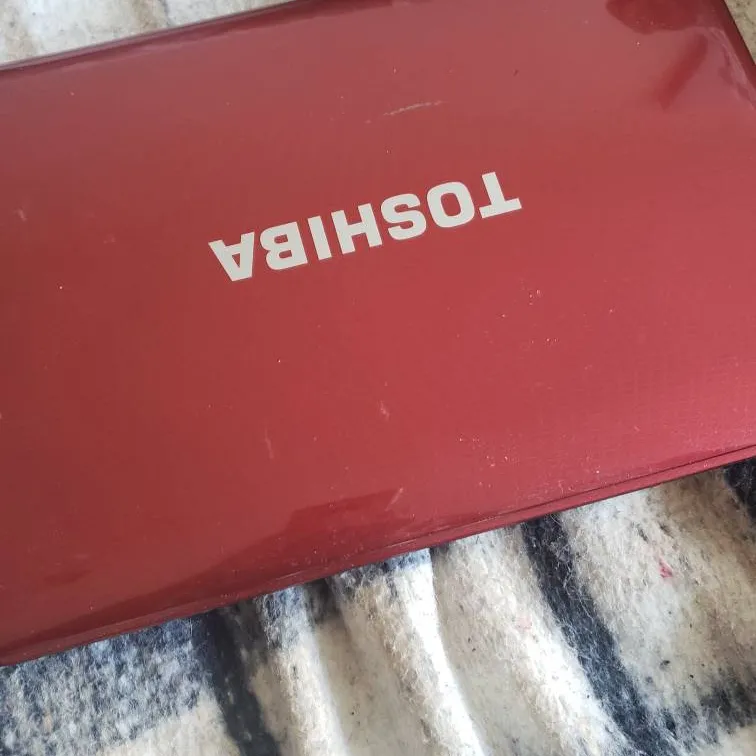 Red Toshiba Laptop photo 1