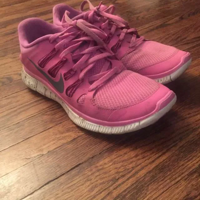 Pink Nike Free Runs photo 1