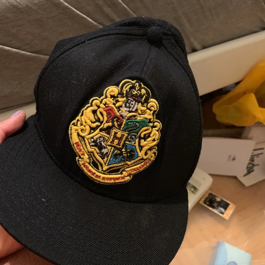 Never Worn Hogwarts Crest Hat photo 1