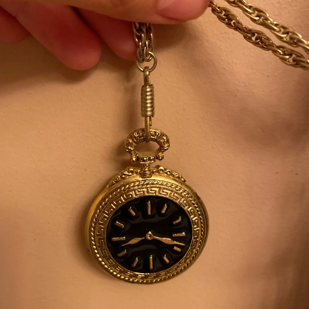Gold Clock Necklace photo 1