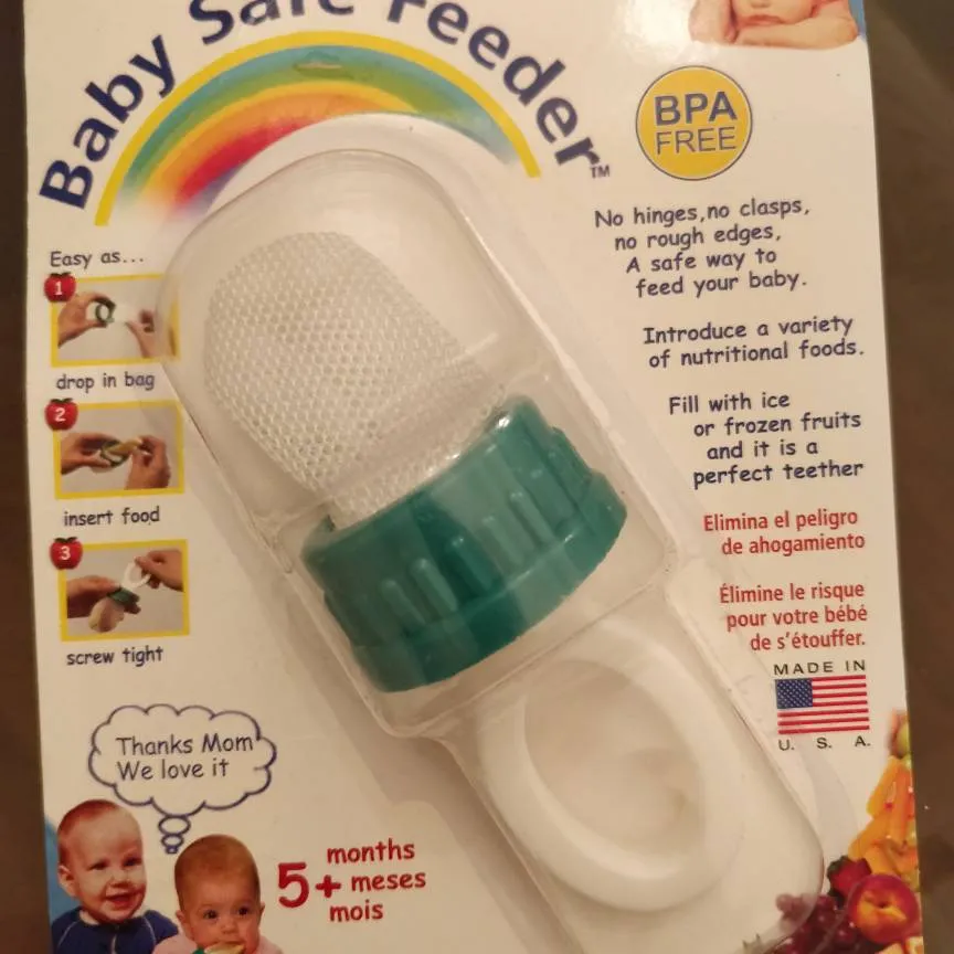 NEW - 3 Packages Of Pacifiers And 1 Baby Feeder! photo 7