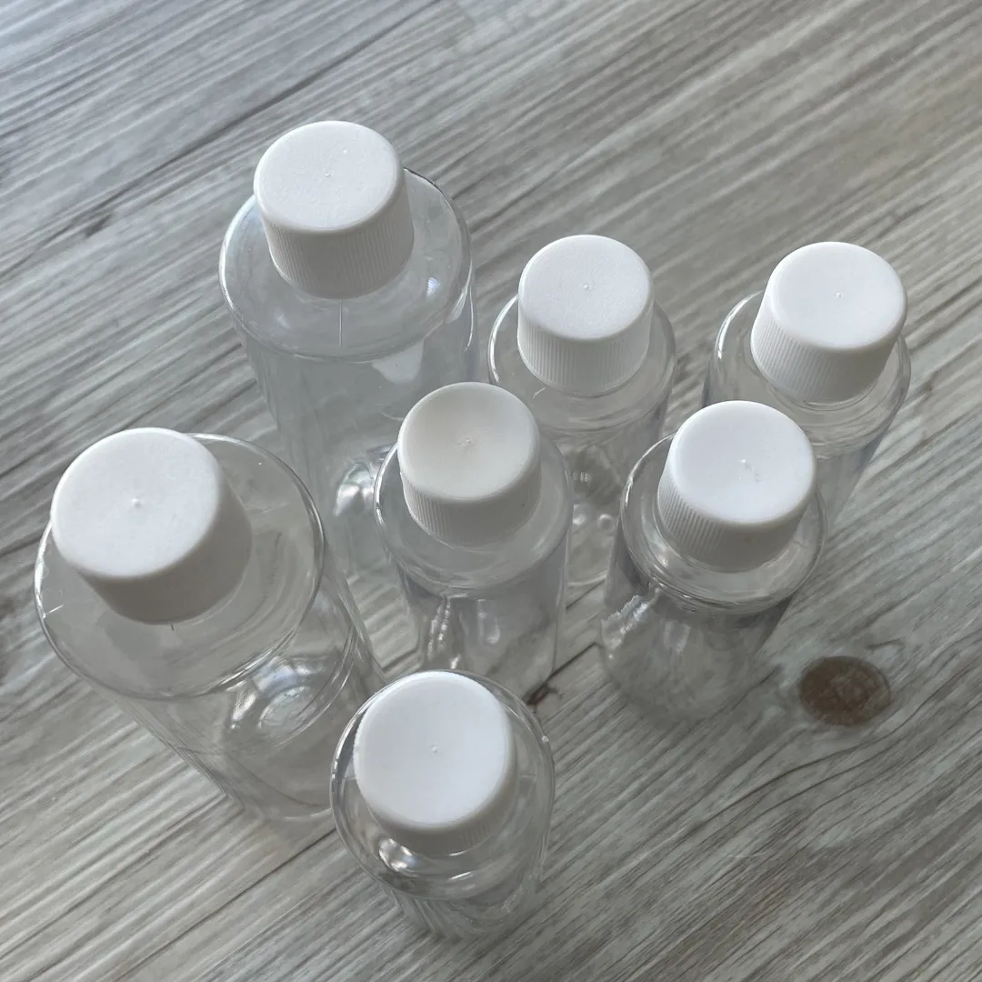 Set Of Empty Travel Size Bottles photo 5