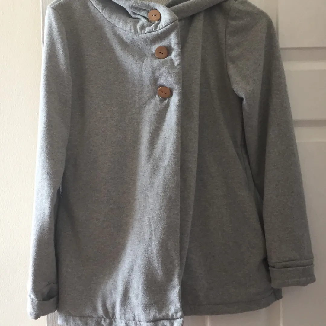 Cozy Sweater With Wooden Buttons photo 1
