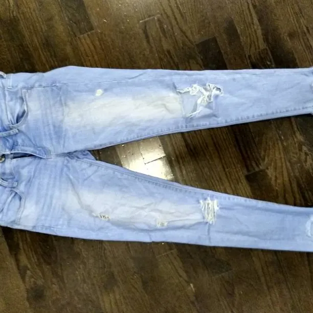 Ripped Low Rise Stretchy American Eagle Jeans size 8 photo 1