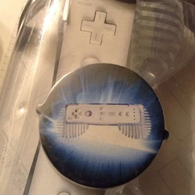 Wii remote grips and an Xbox controller missing a battery! photo 3