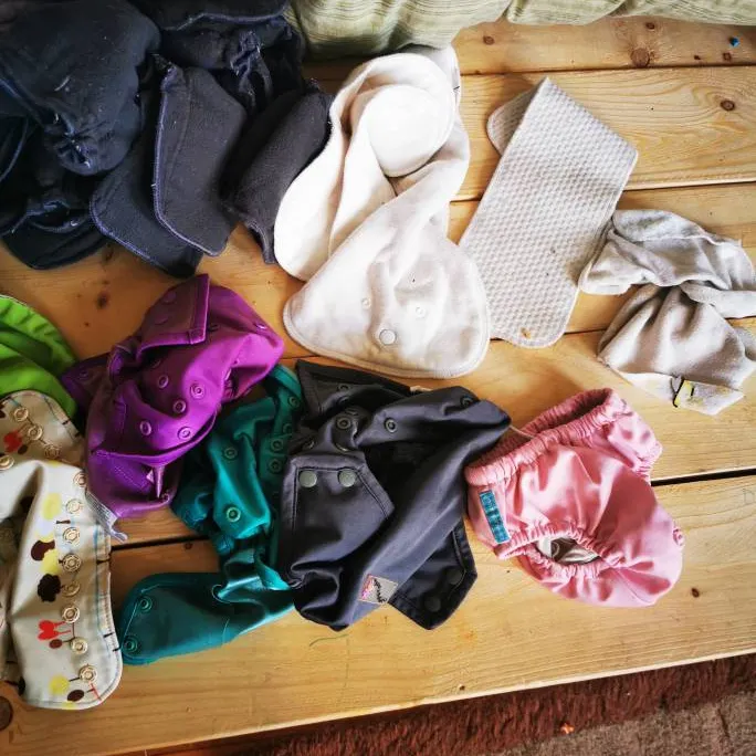 Cloth Diapers, Prefolds, A Blanket And Swim Diaper For Babies photo 4
