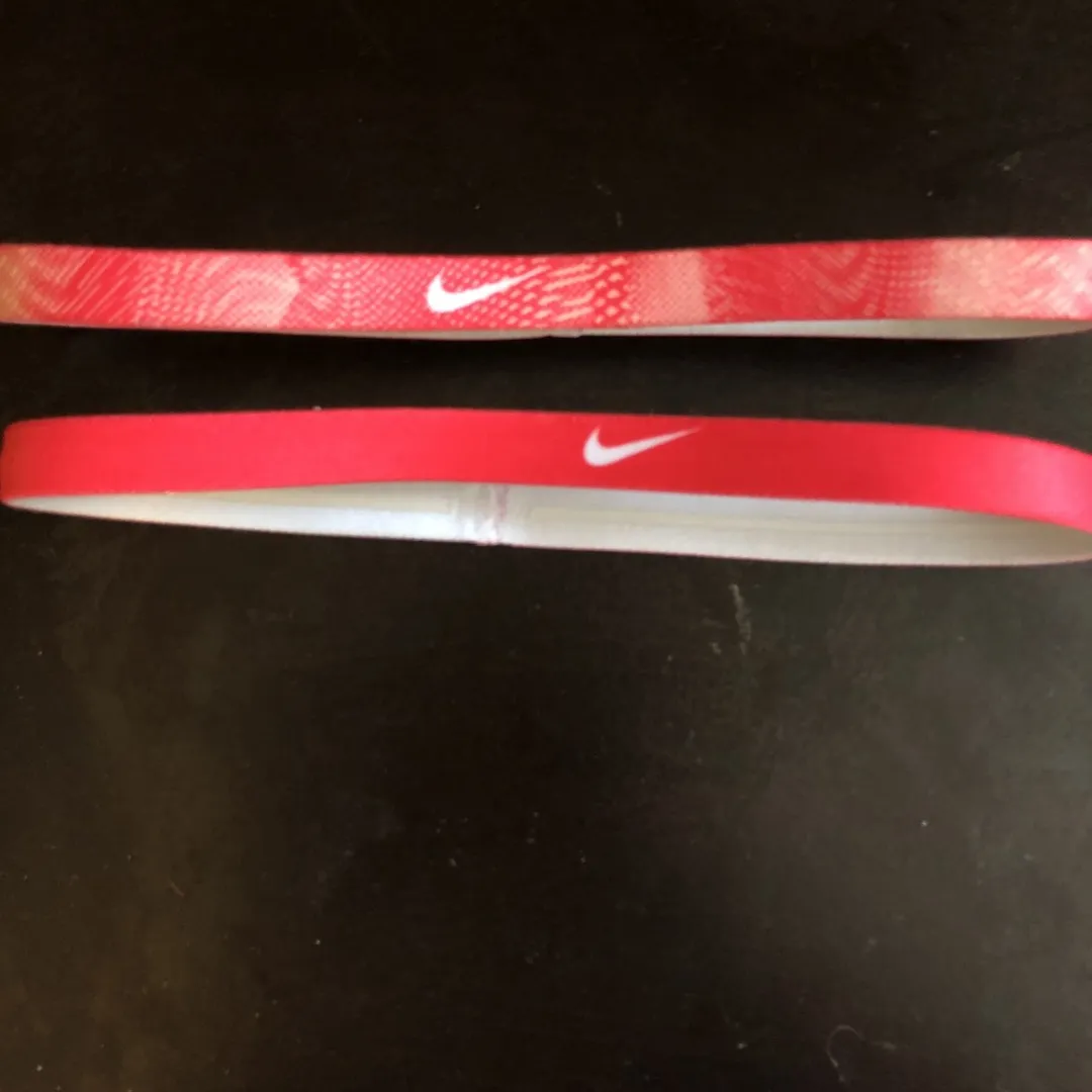 Two Pink Nike Headbands photo 1