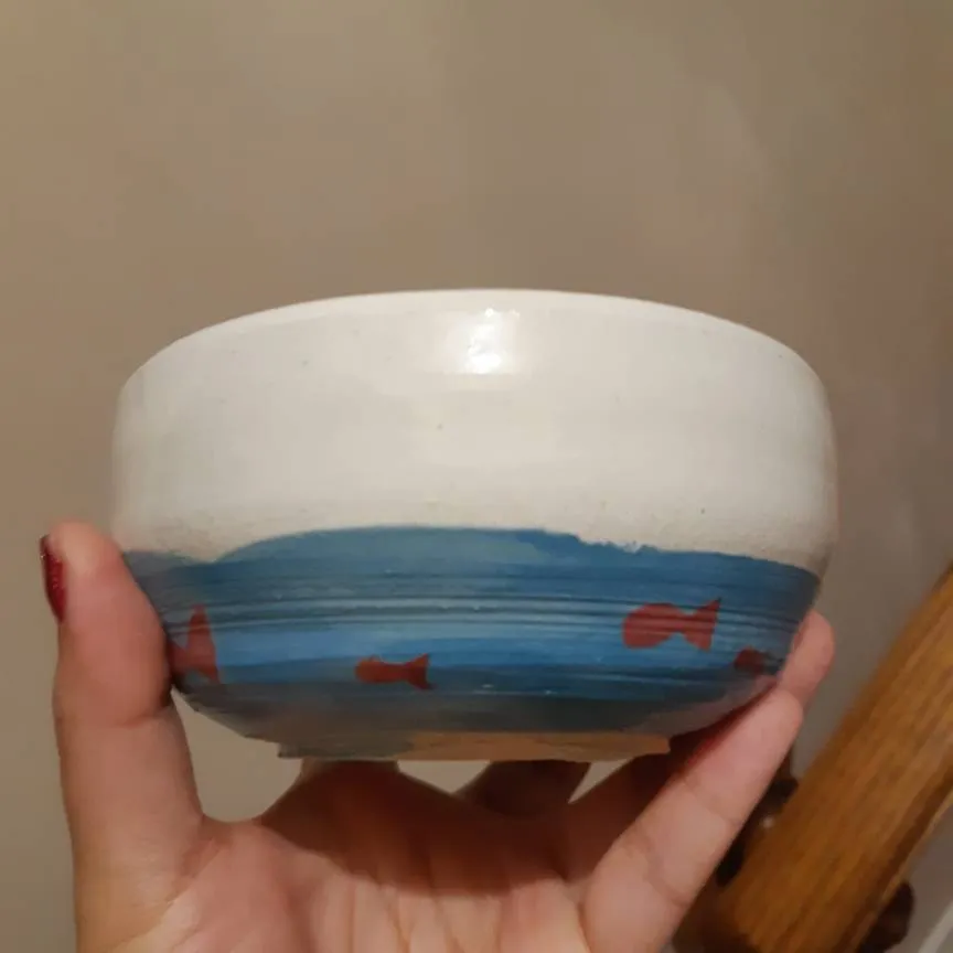 Handmade Pottery Bowl With Fish Design photo 1
