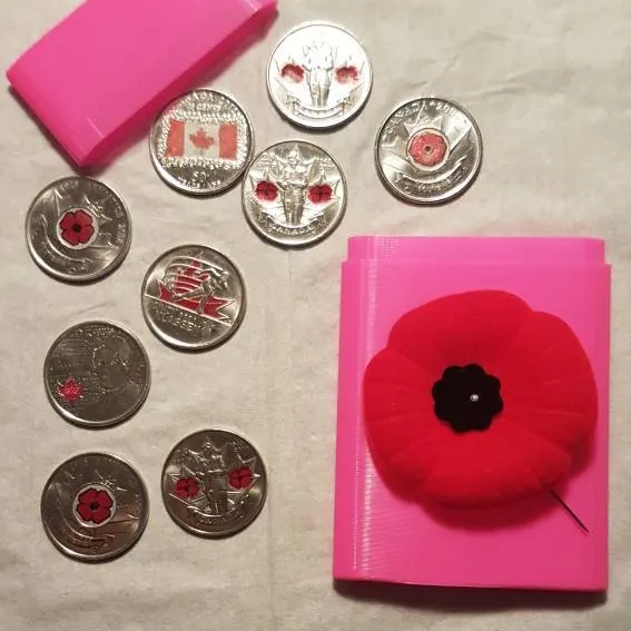 Pink Coin holder with 9 coloured quarters. photo 1