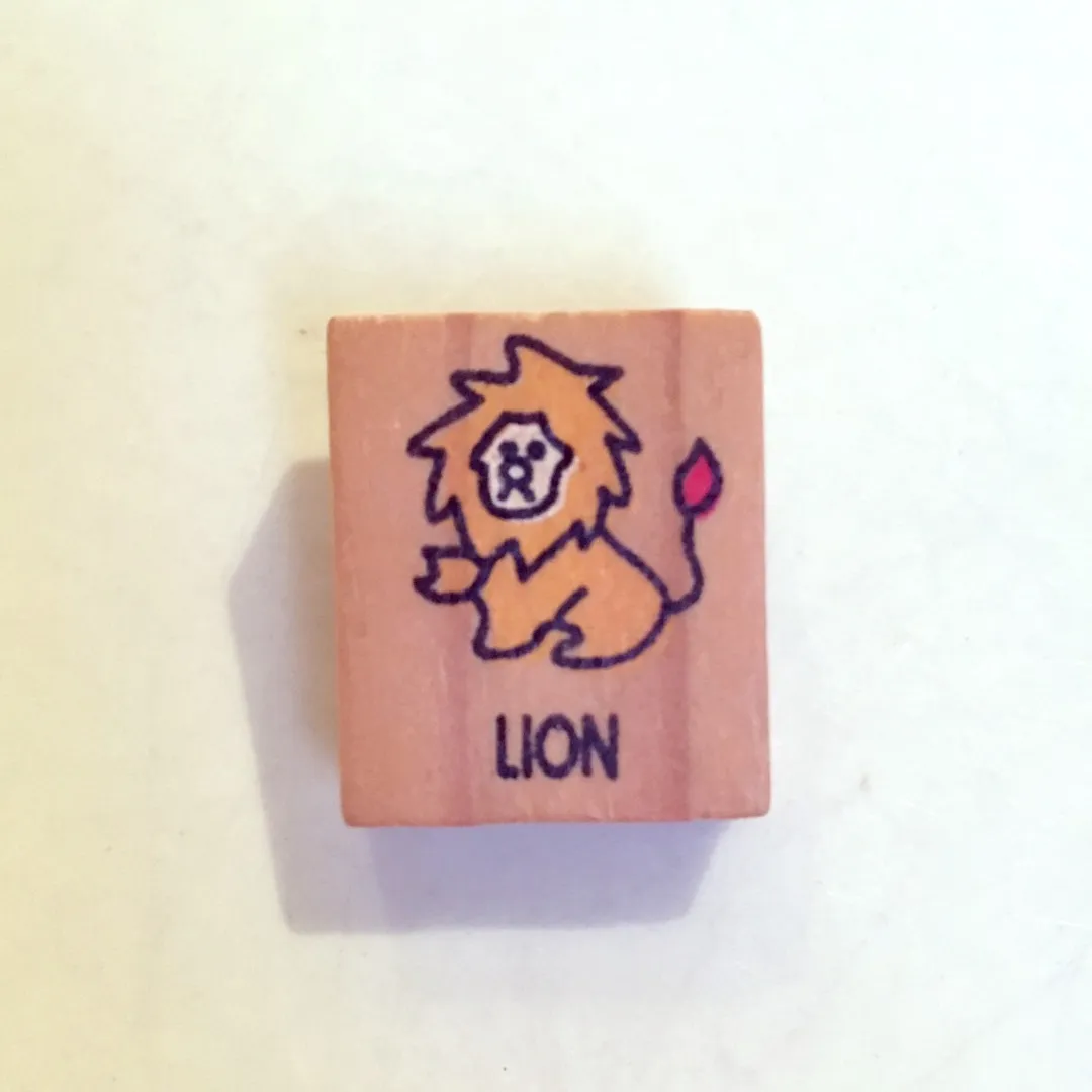 Free With Trade! Painted wooden lion pin photo 1