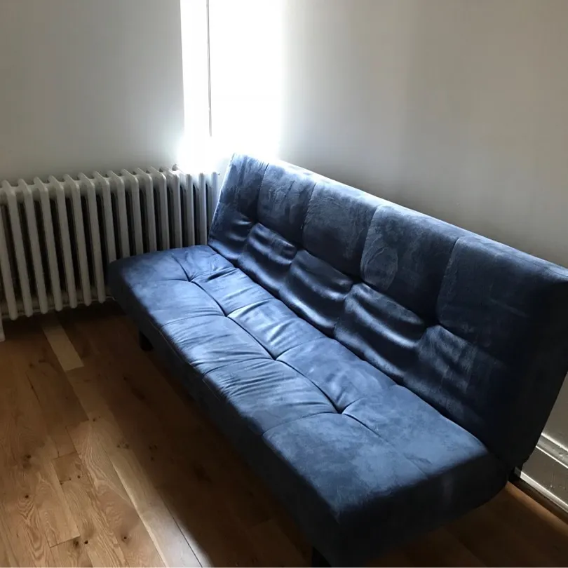 Dark blue sofa bed photo 1