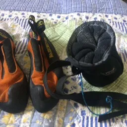 Rock climbing shoes and chalk bag photo 1
