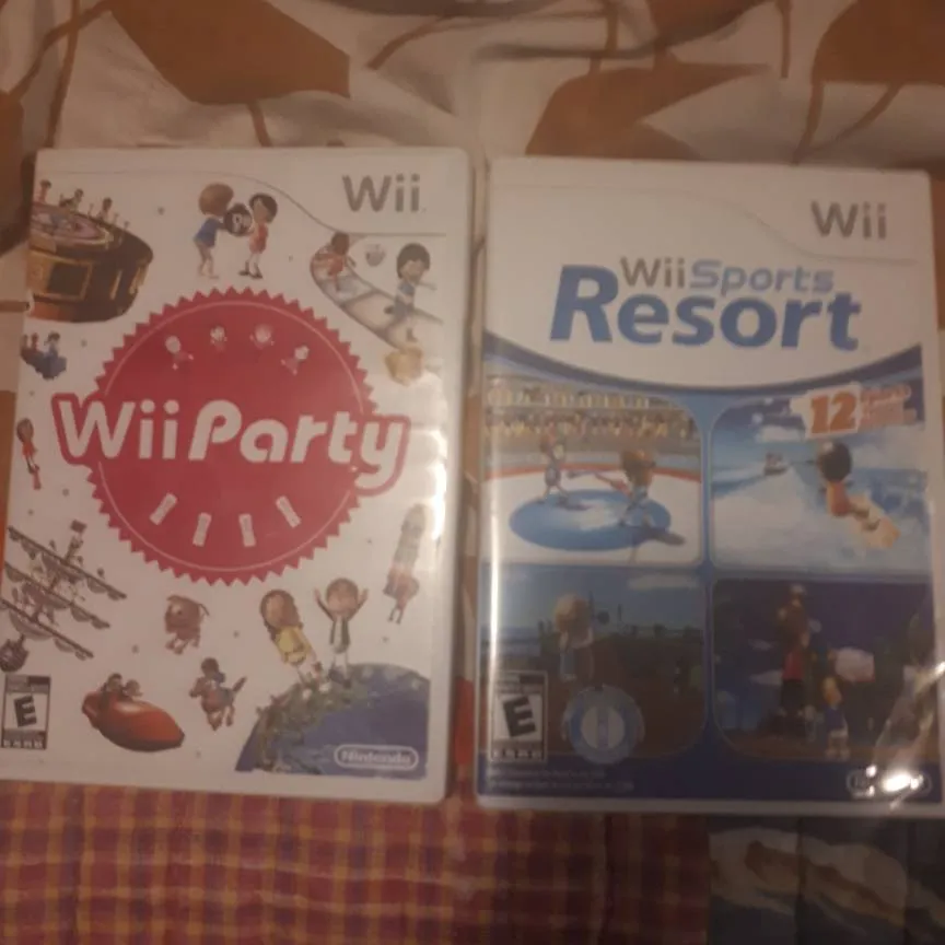 Nintendo Wii games and controller photo 1