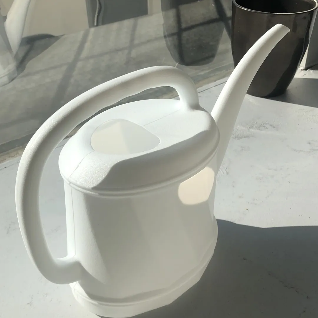 Beautiful Plastic White Watering Can photo 1
