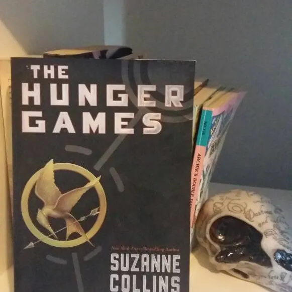 The Hunger Games By Suzanne Collins (Novel) photo 1