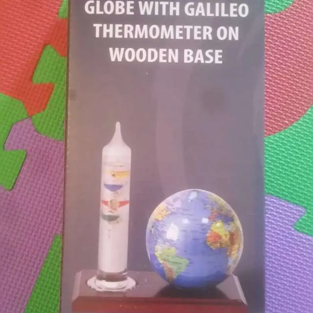 Globe with Galileo thermometer photo 1