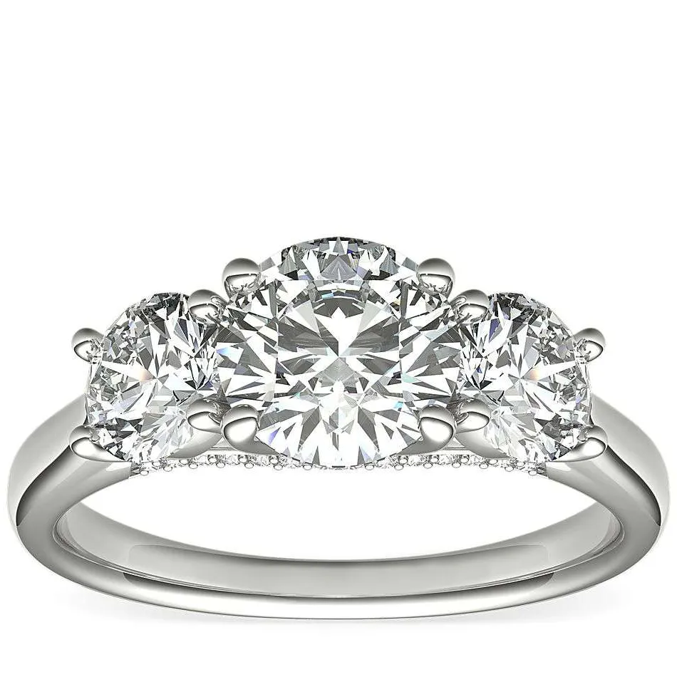 With a three-stone diamond engagement ring, transform your ap... photo 1