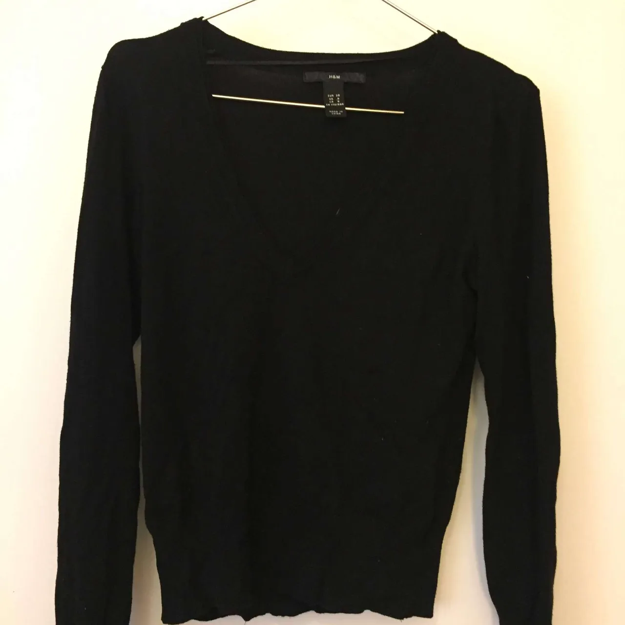 Simple black stretchy  h and m sweater, fits medium photo 1