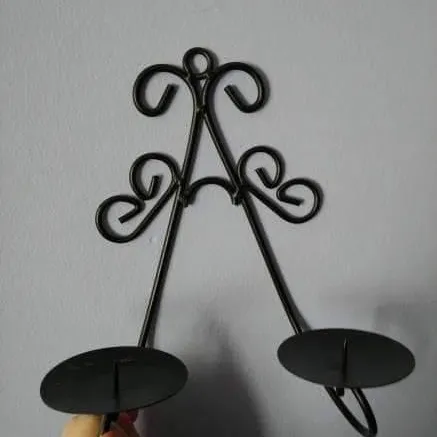 Two Wrought Iron Wall Mounted Candle Holders photo 1