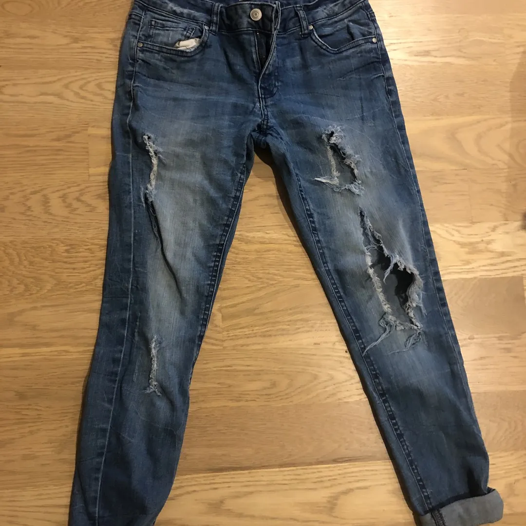 Extreme Hole-y Jeans Size 26 photo 1