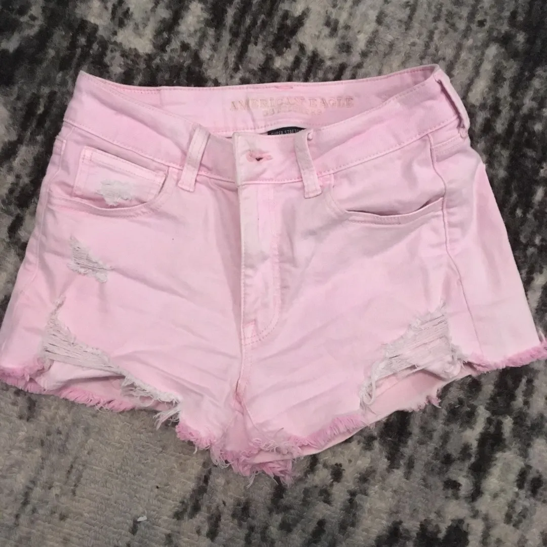 Size 4 Light Pink Ripped Denim Shorts photo 1