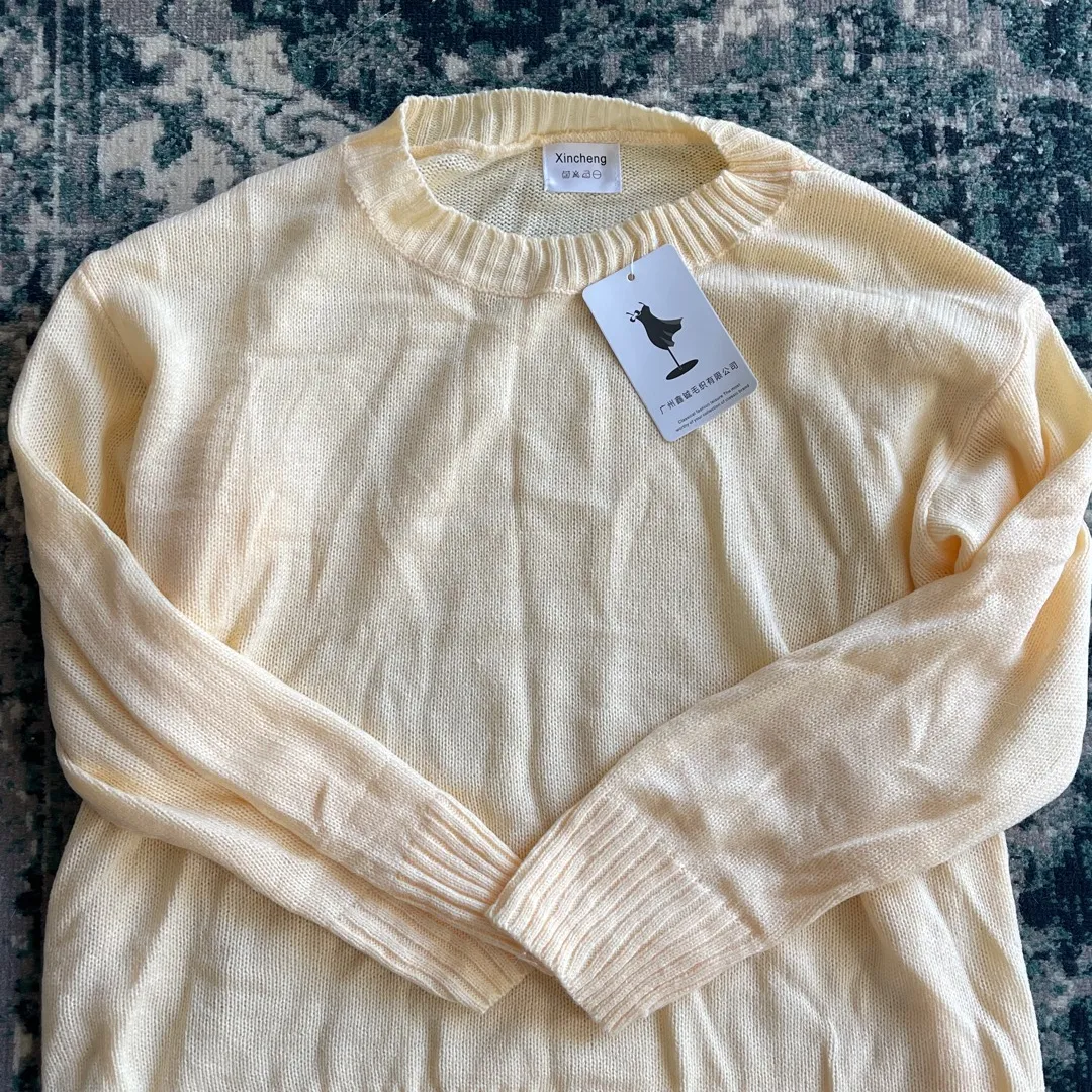beige sweater photo 1