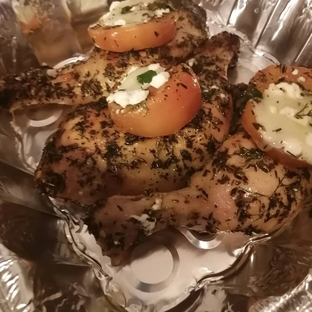 Roasted Herb Chicken Topped With Cheese And Tomatoes photo 1