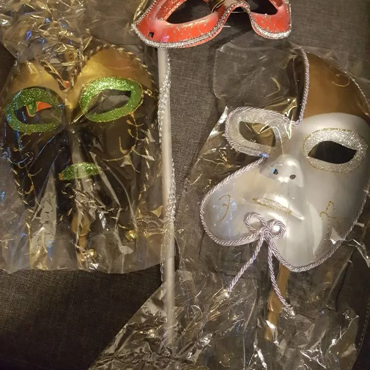 Assorted Handheld Masks photo 1
