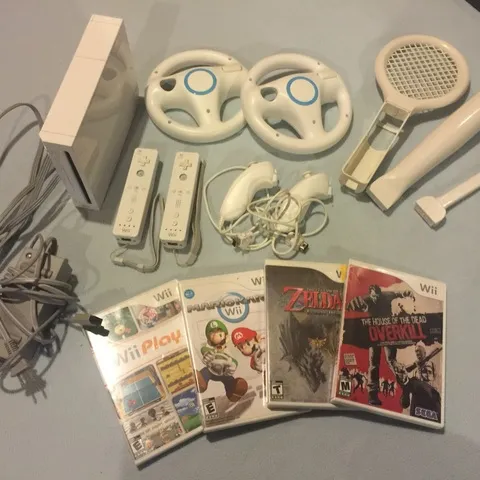 Nintendo Wii + Games + Accessories photo 1