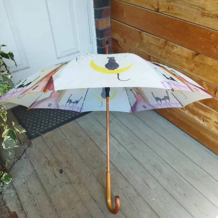 Cat-themed umbrella photo 1
