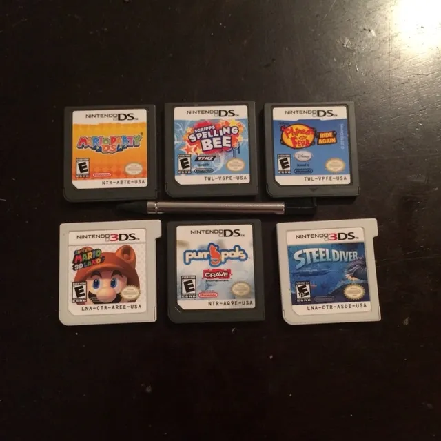 Nintendo DS Games And Pen photo 1