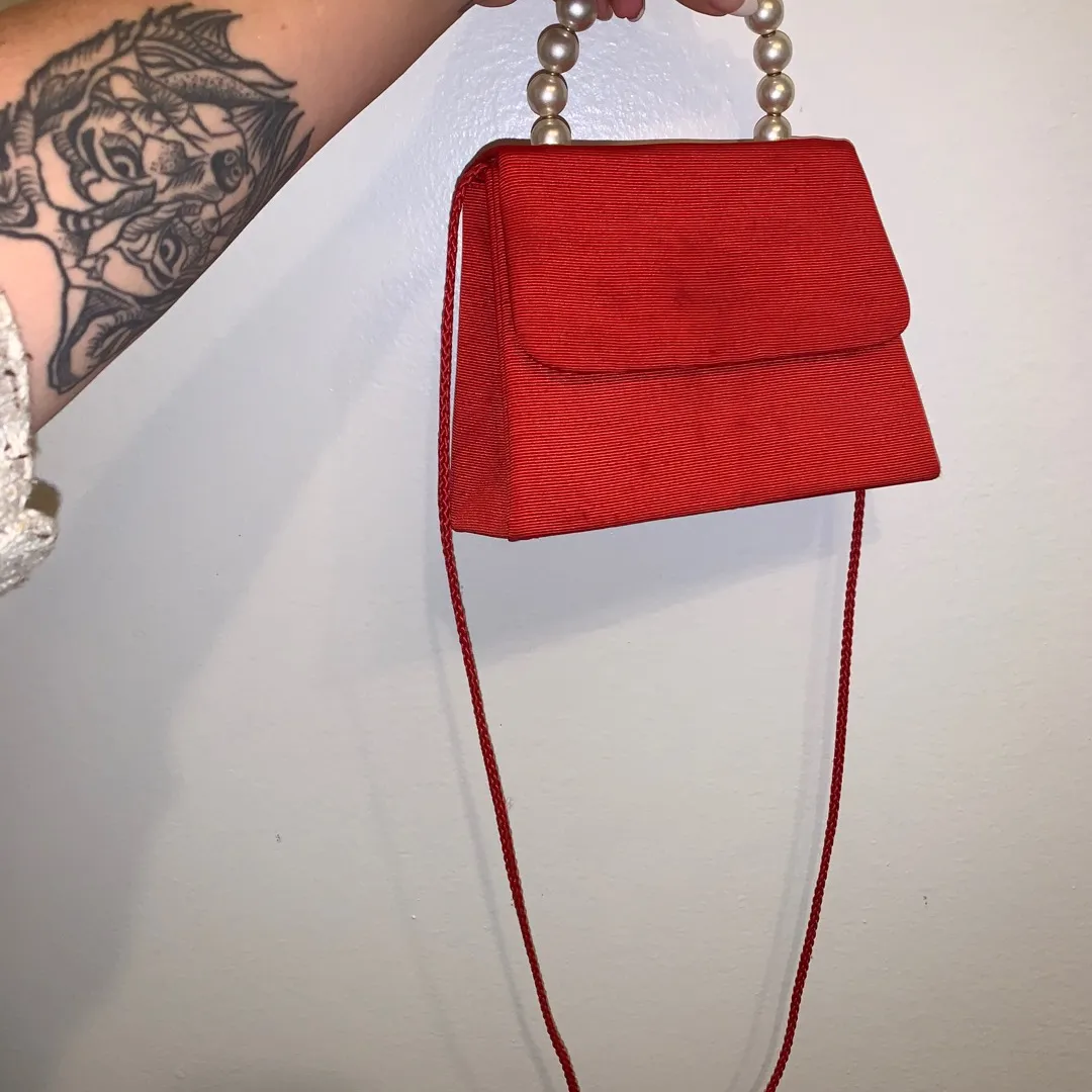 Red Purse With Pearl Handle photo 1