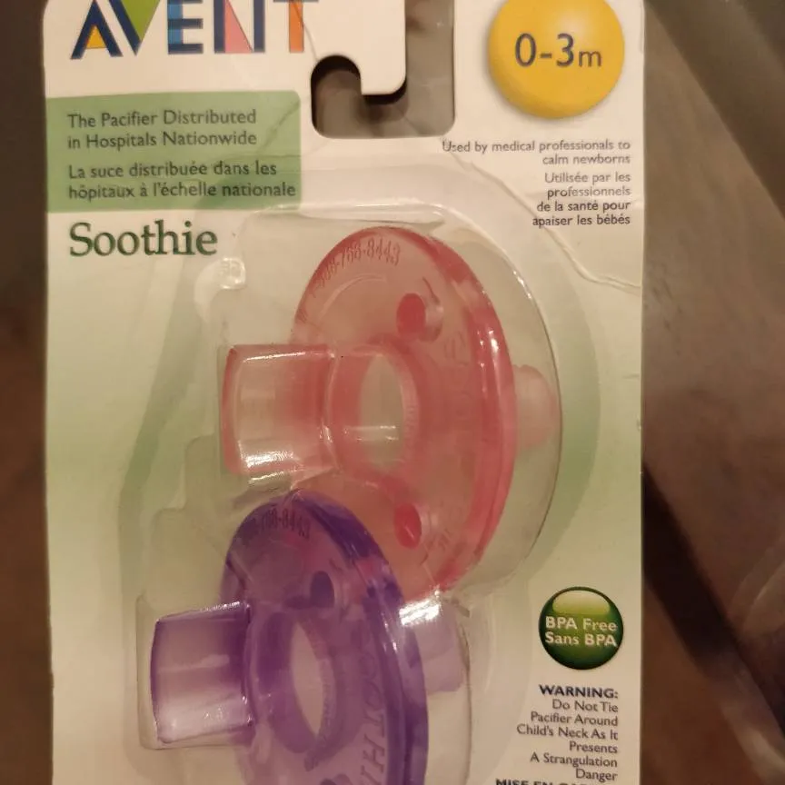 NEW - 3 Packages Of Pacifiers And 1 Baby Feeder! photo 3