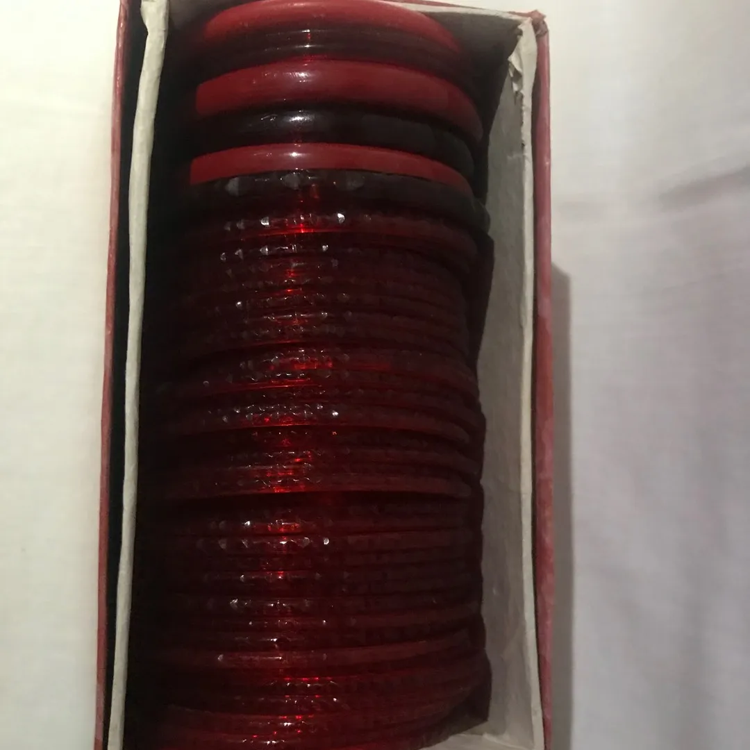 Box Of Red Sparkly Bangles photo 1