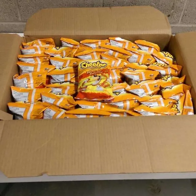 42 - 90gram Bags of Doritos Crunchy Flaming Hot. photo 1